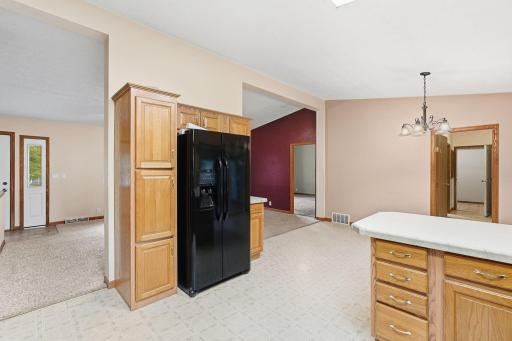 Kitchen, looking into the open area between the informal dining room and living room