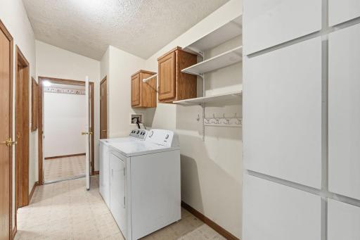 Main Floor laundry leading to the very large mud room then to the attached garage
