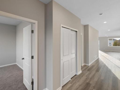 PHOTO OF A DIFFERENT HOME WITH SIMILAR PLAN. FINISHES MAY VARY.