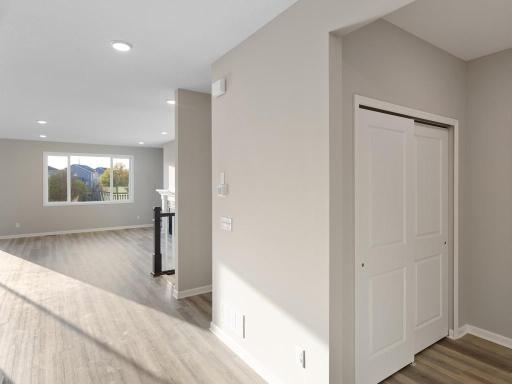 PHOTO OF A DIFFERENT HOME WITH SIMILAR PLAN. FINISHES MAY VARY.