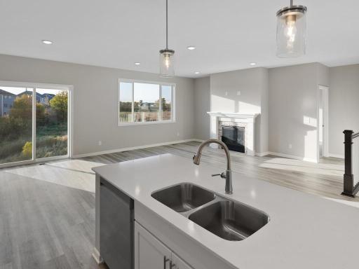 PHOTO OF A DIFFERENT HOME WITH SIMILAR PLAN. FINISHES MAY VARY.