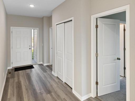 PHOTO OF A DIFFERENT HOME WITH SIMILAR PLAN. FINISHES MAY VARY. Foyer.