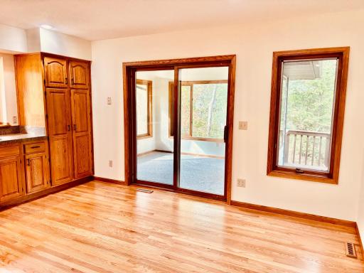 Sunroom adjacent to kitchen/ morning coffee!