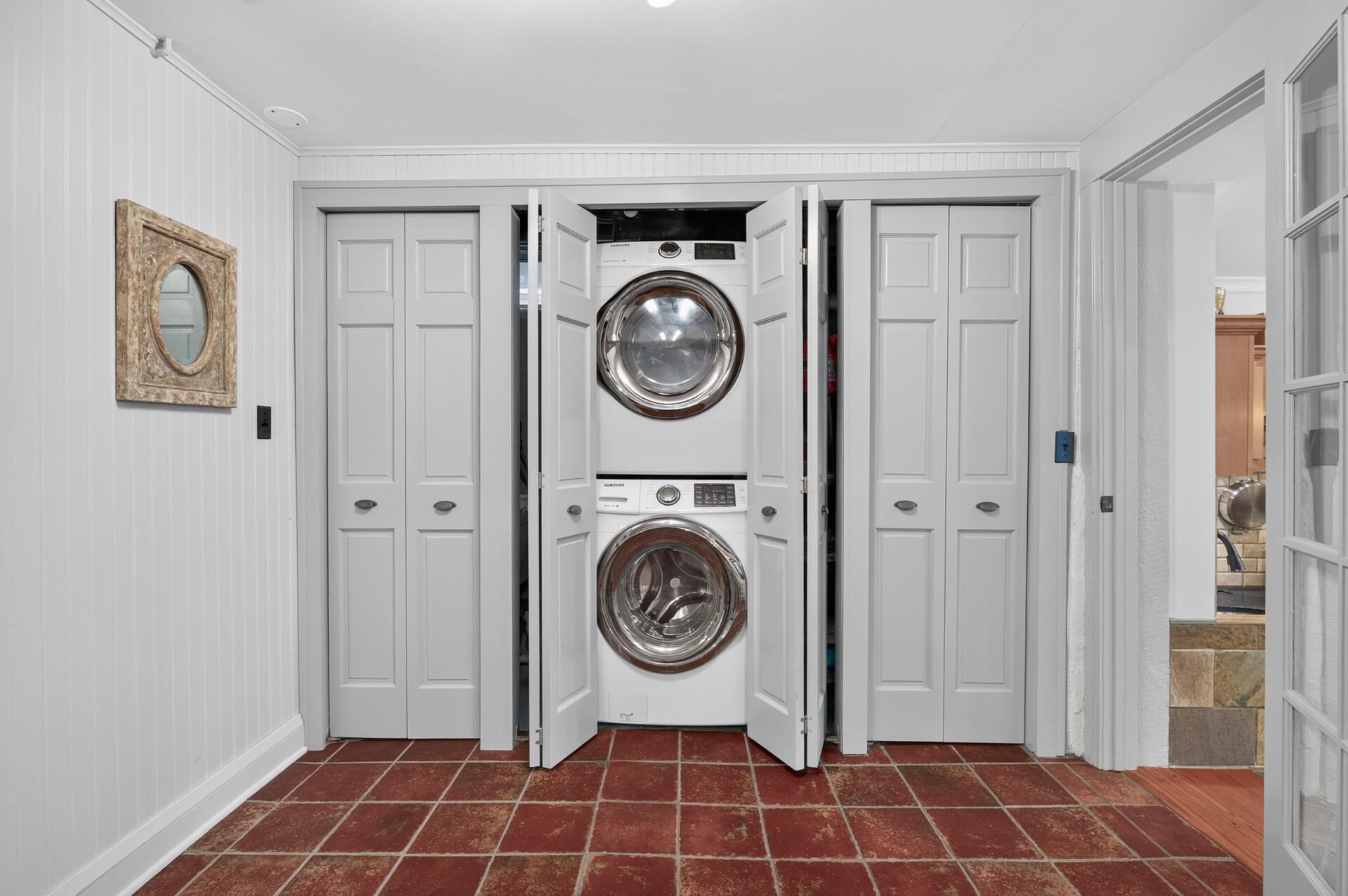Private lower-level laundry completes this truly self-contained apartment.