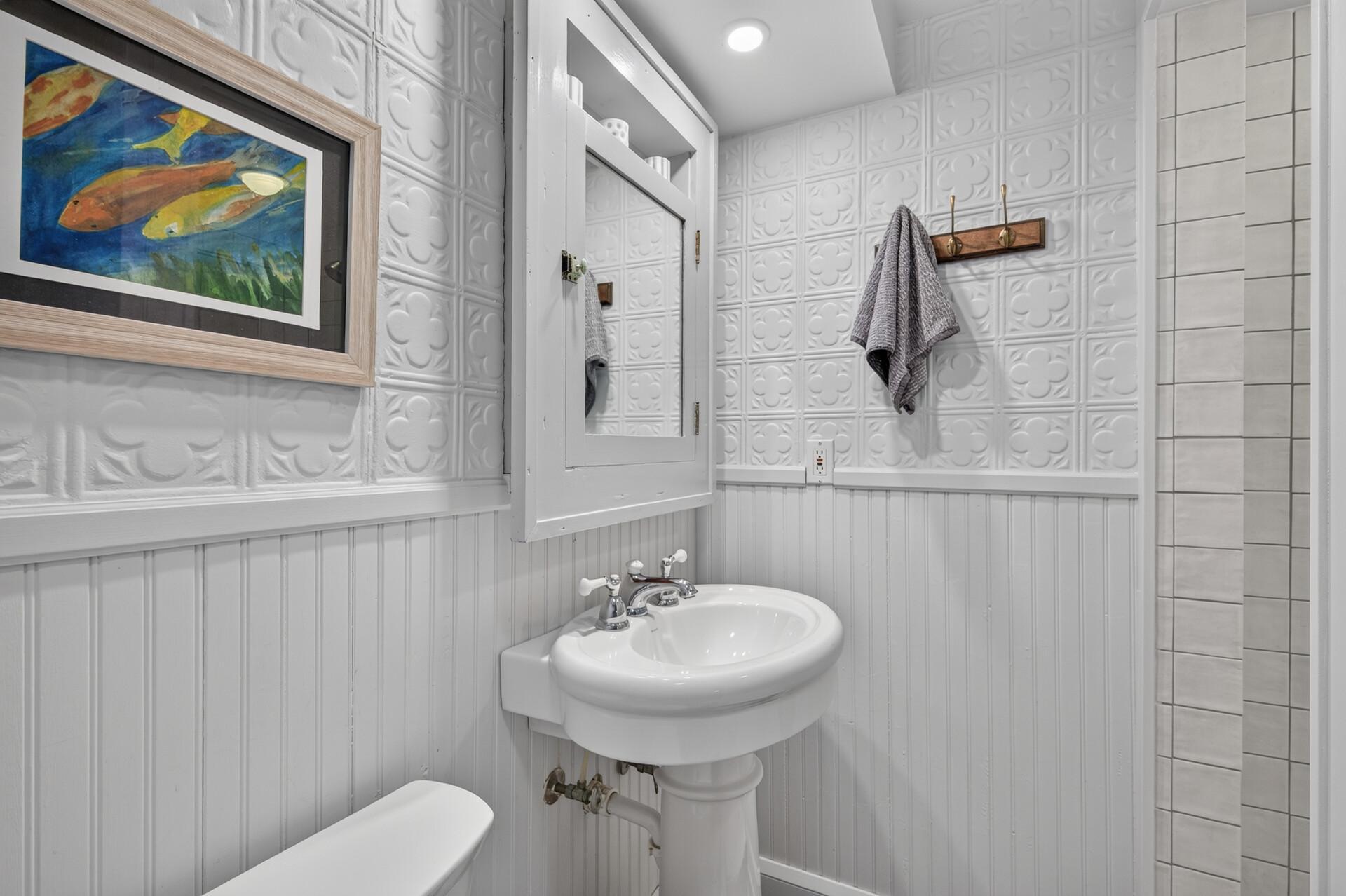 Lower-level 3/4 bath.