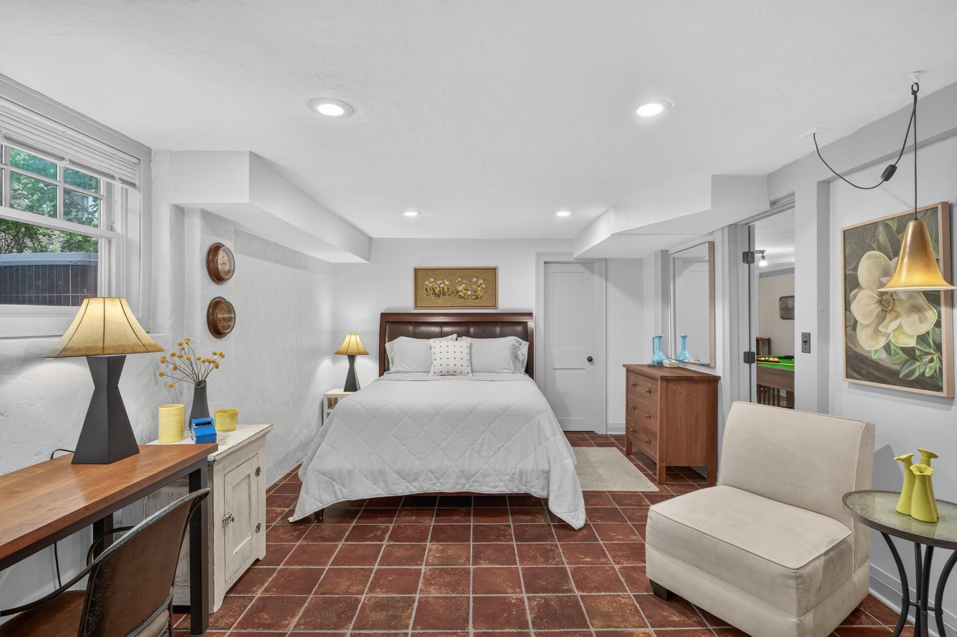 First of two comfortable lower-level bedrooms.
