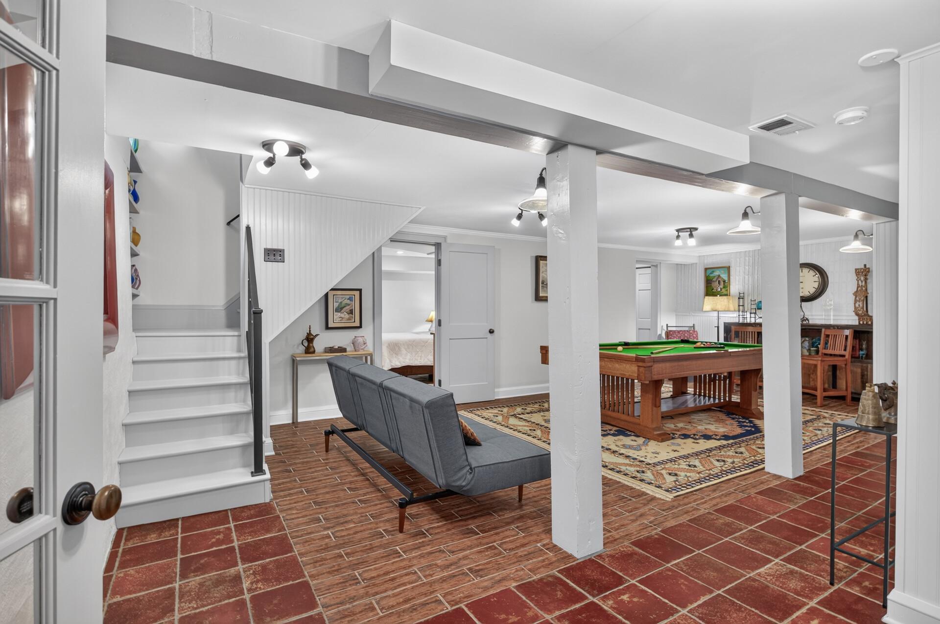 Spacious billiard/game room offers a fun, separate space for entertaining guests.