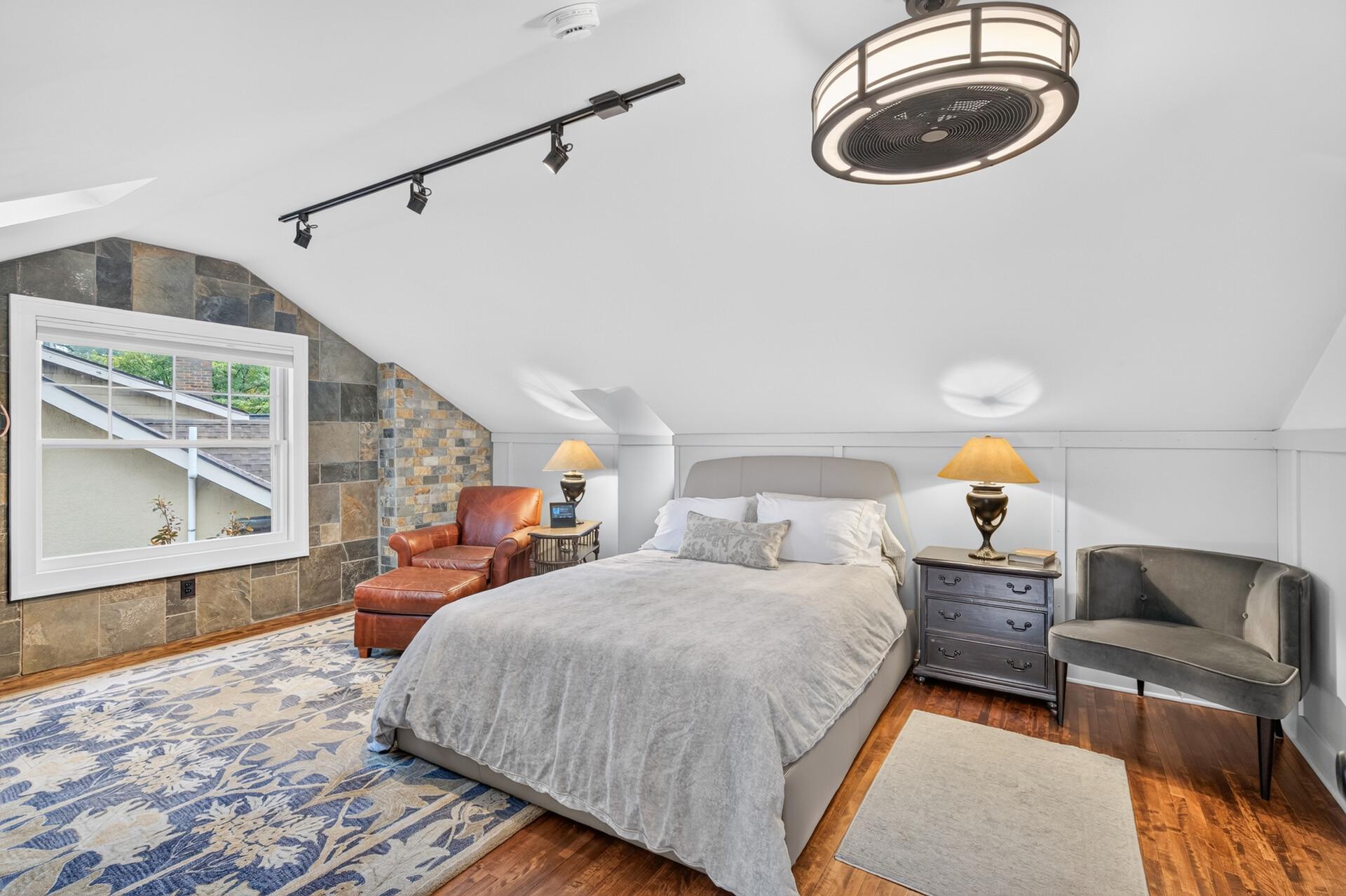 Private upper-level primary bedroom retreat.