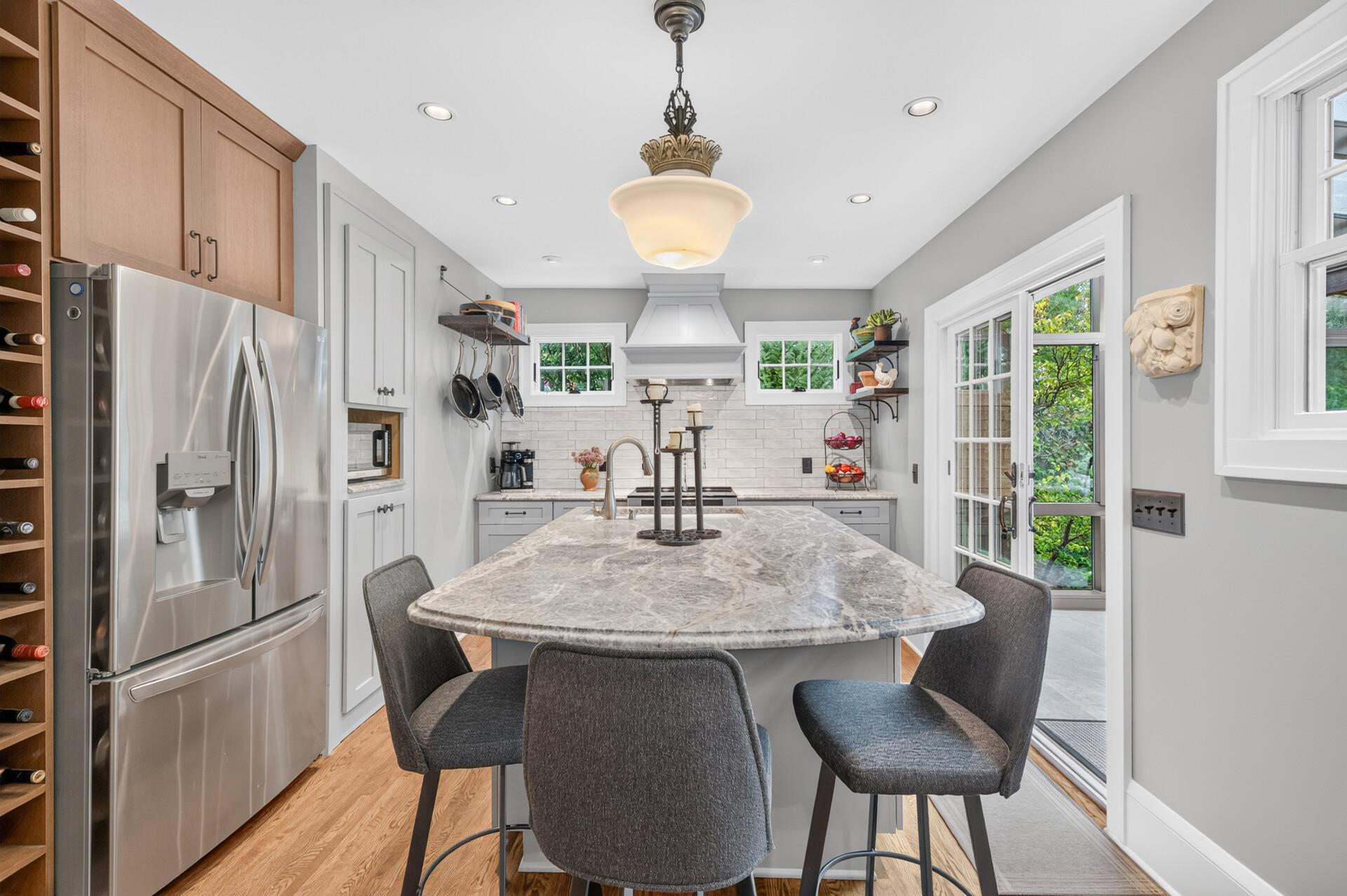 Beautifully remodeled kitchen filled with natural light.