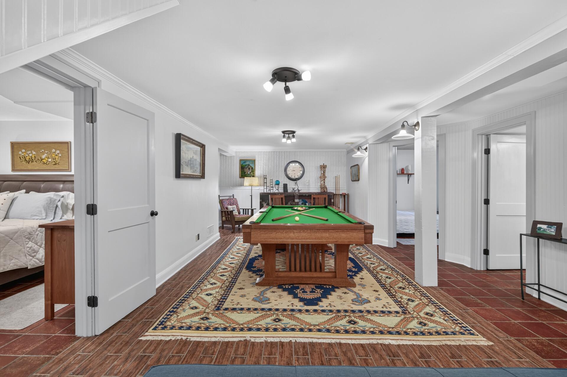 A dedicated game room adds another dimension to the lower-level living space.