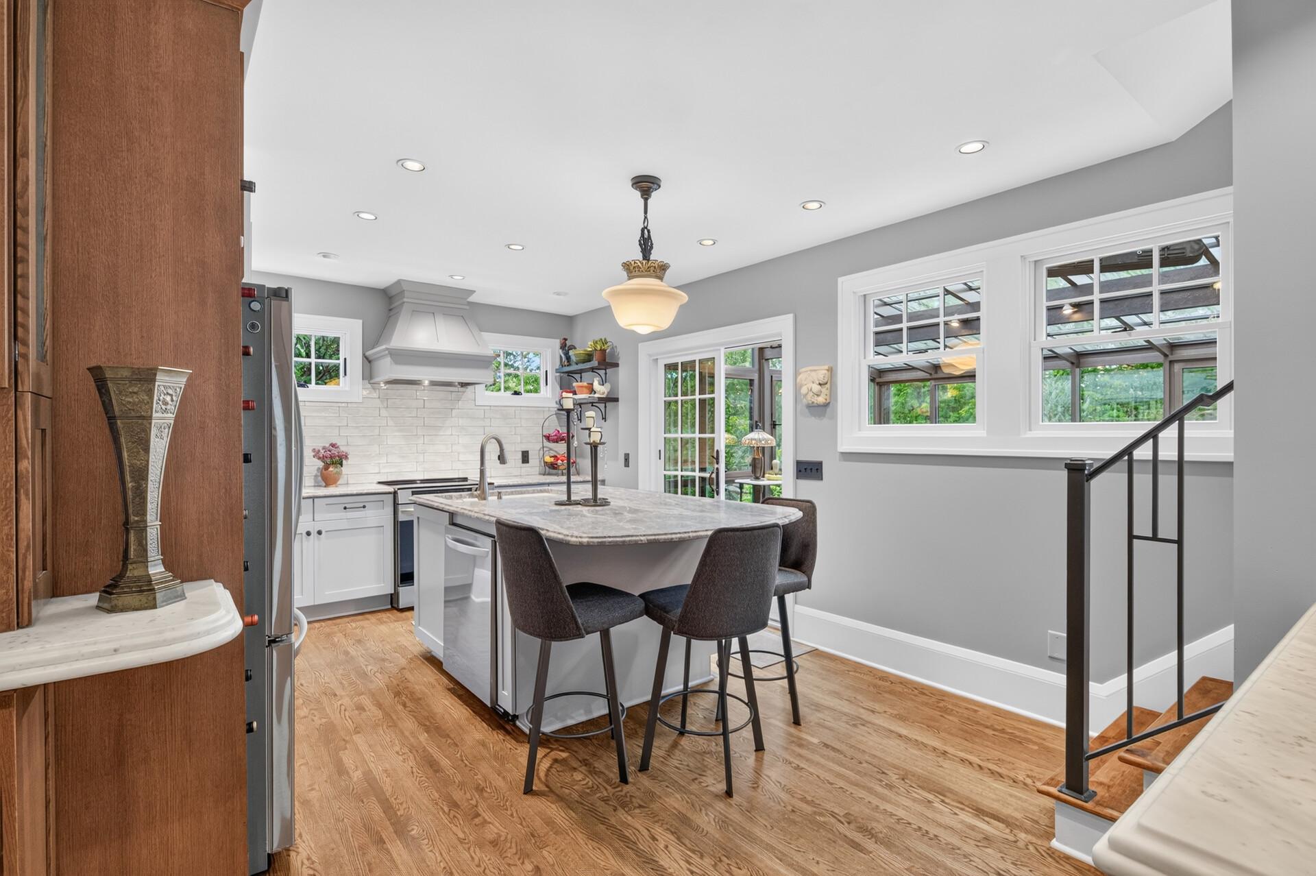 Generous center island provides excellent prep and gathering space.