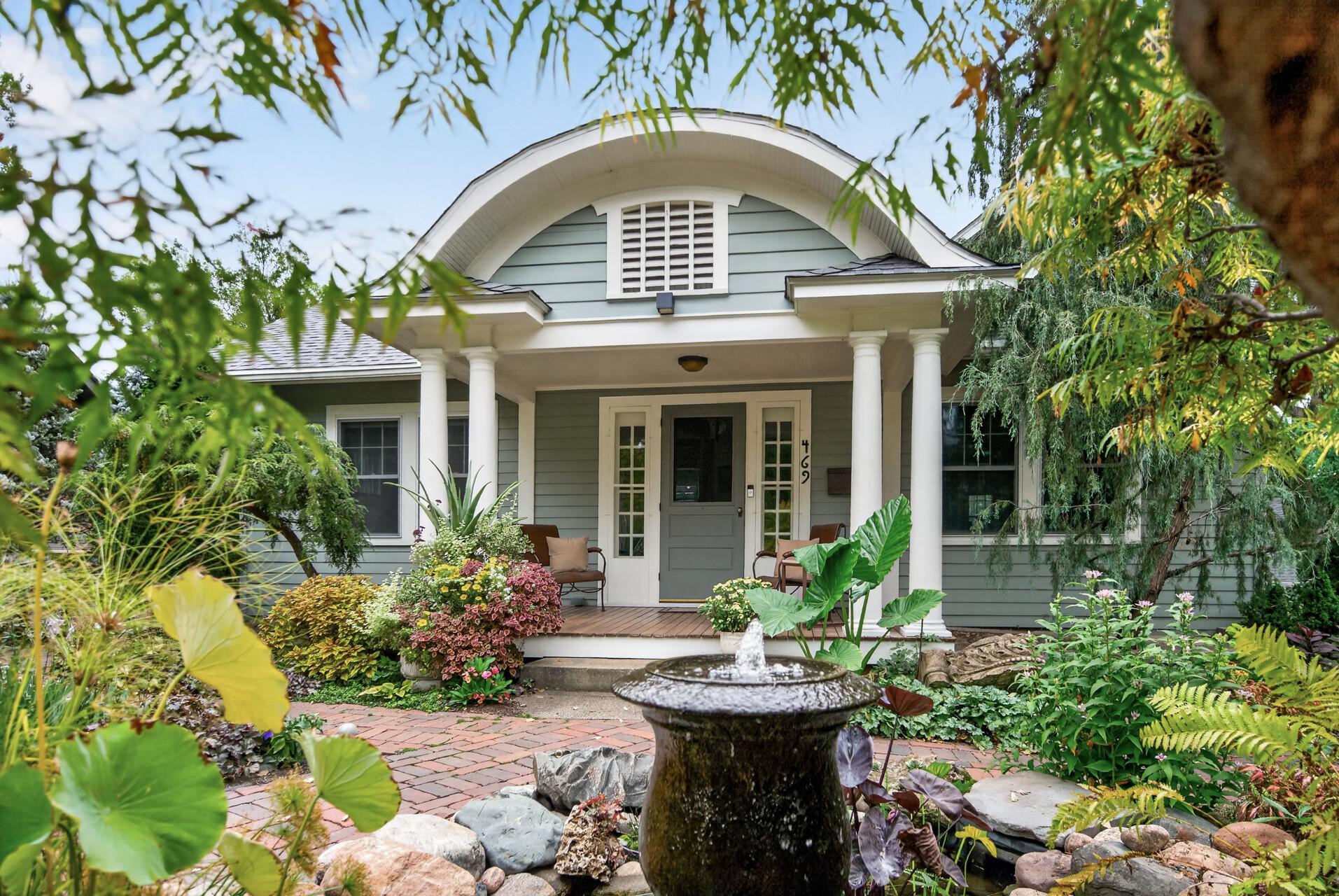 Charming covered front porch provides a warm welcome.