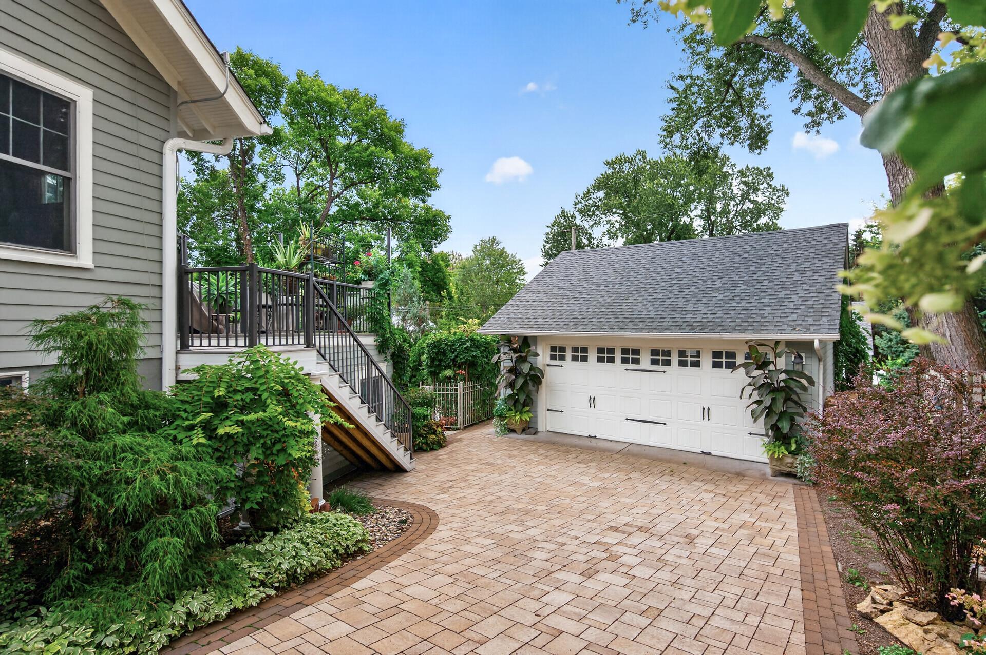 Two-car garage with additional attic storage.