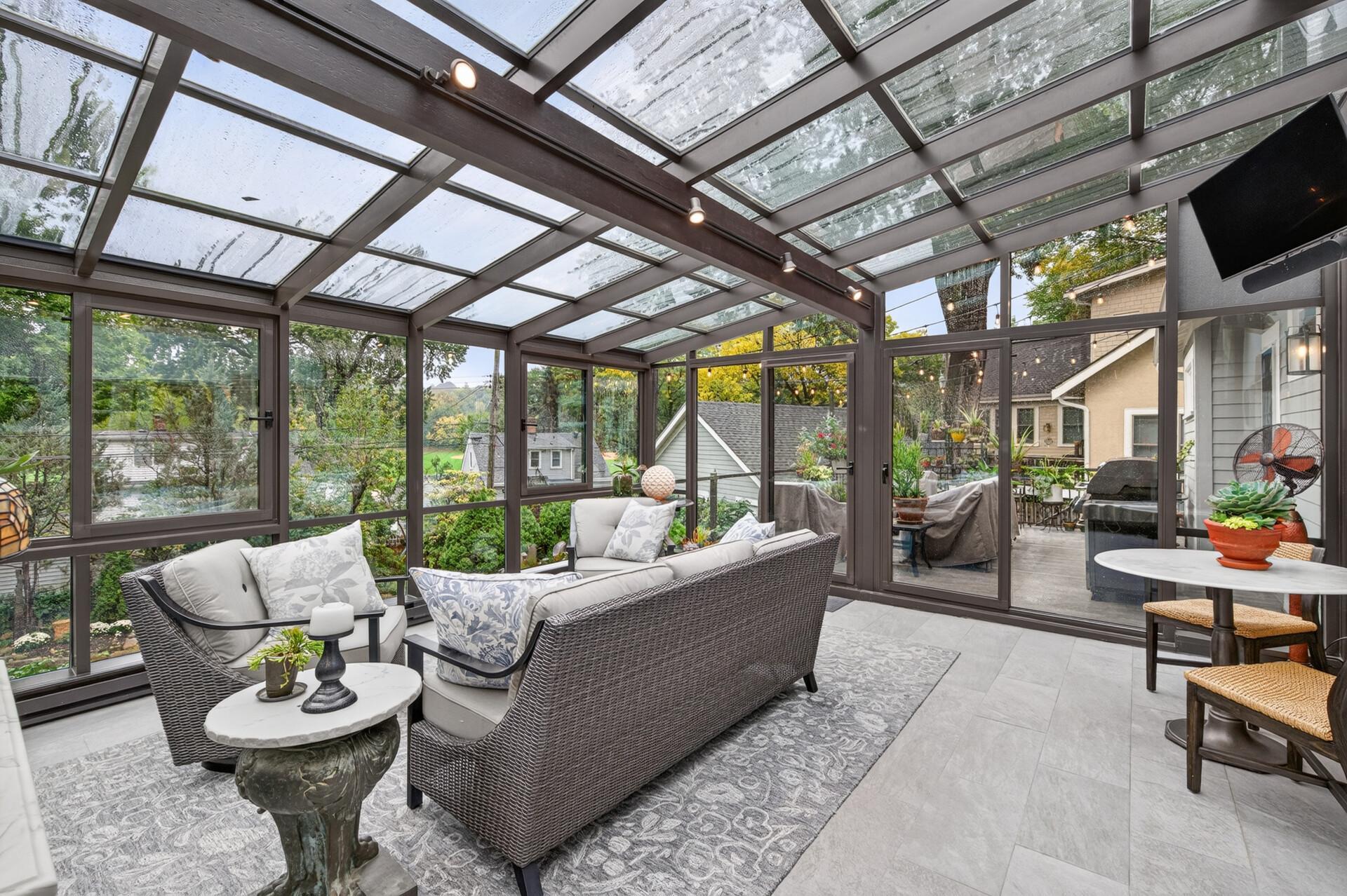 Year-round solarium offers wonderful views of the surrounding gardens.