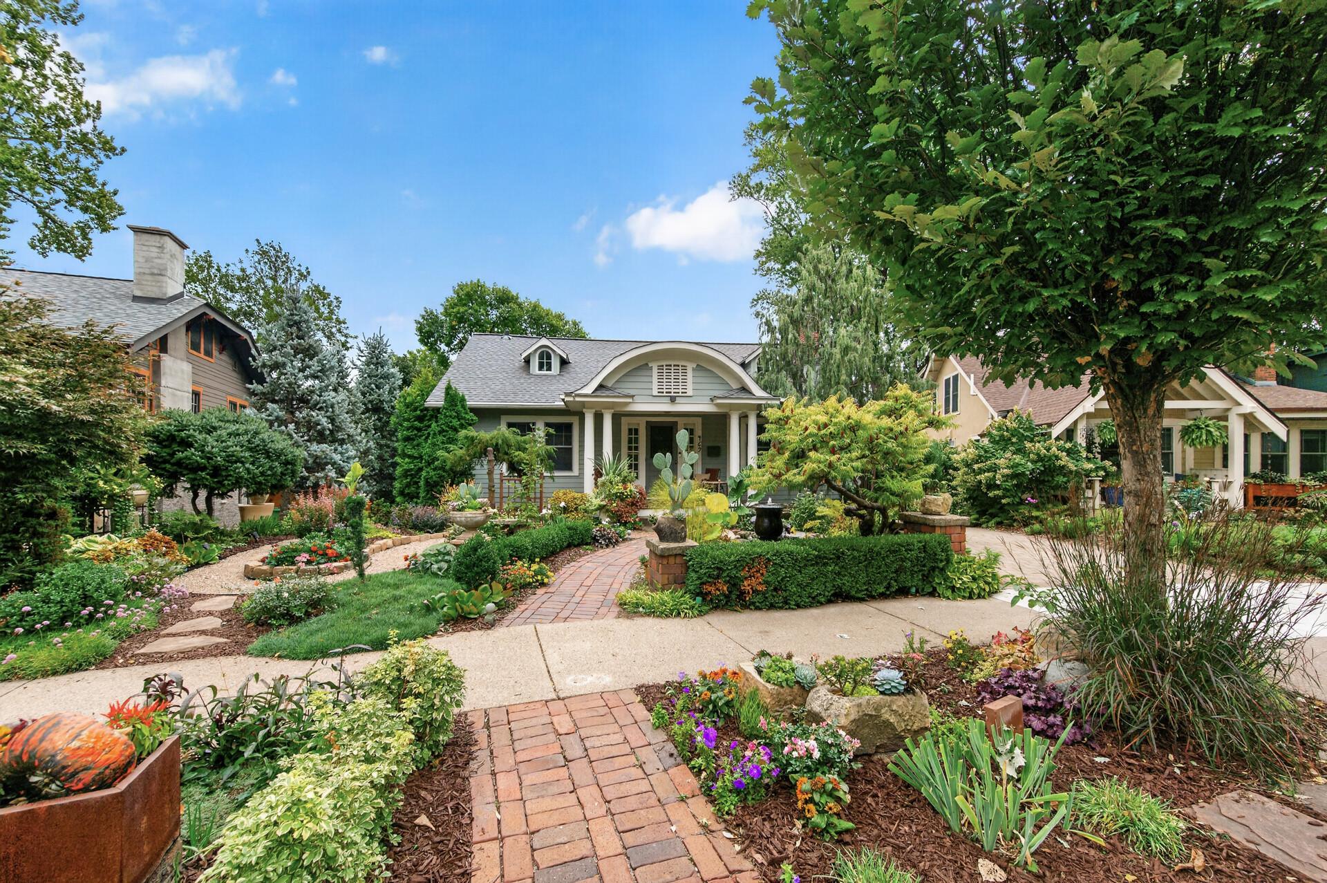 Vintage-brick pathways are part of the garden's distinctive character.