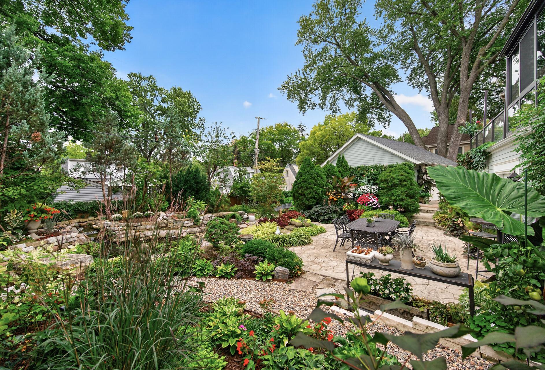 Lush backyard landscaping creates remarkable privacy in the heart of the city.
