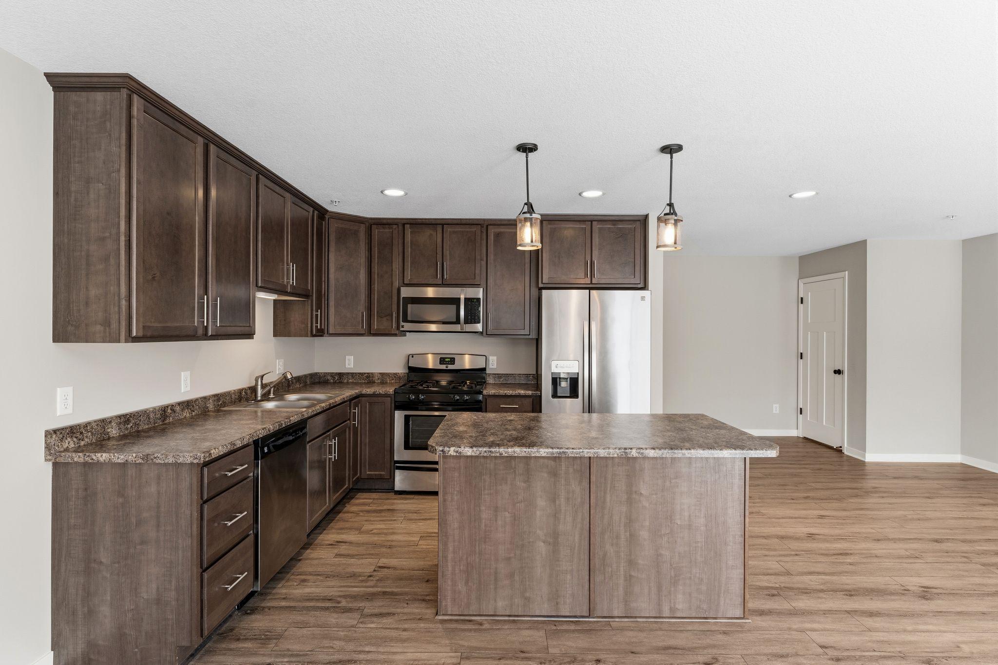 Large Kitchen with Stainless Steel Appliances