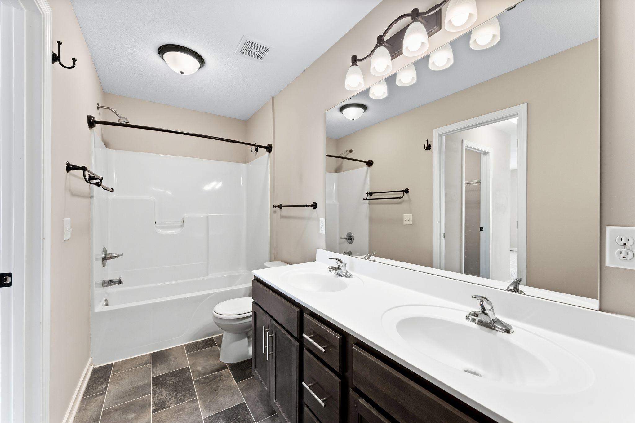 Full Bathroom with Double Sinks