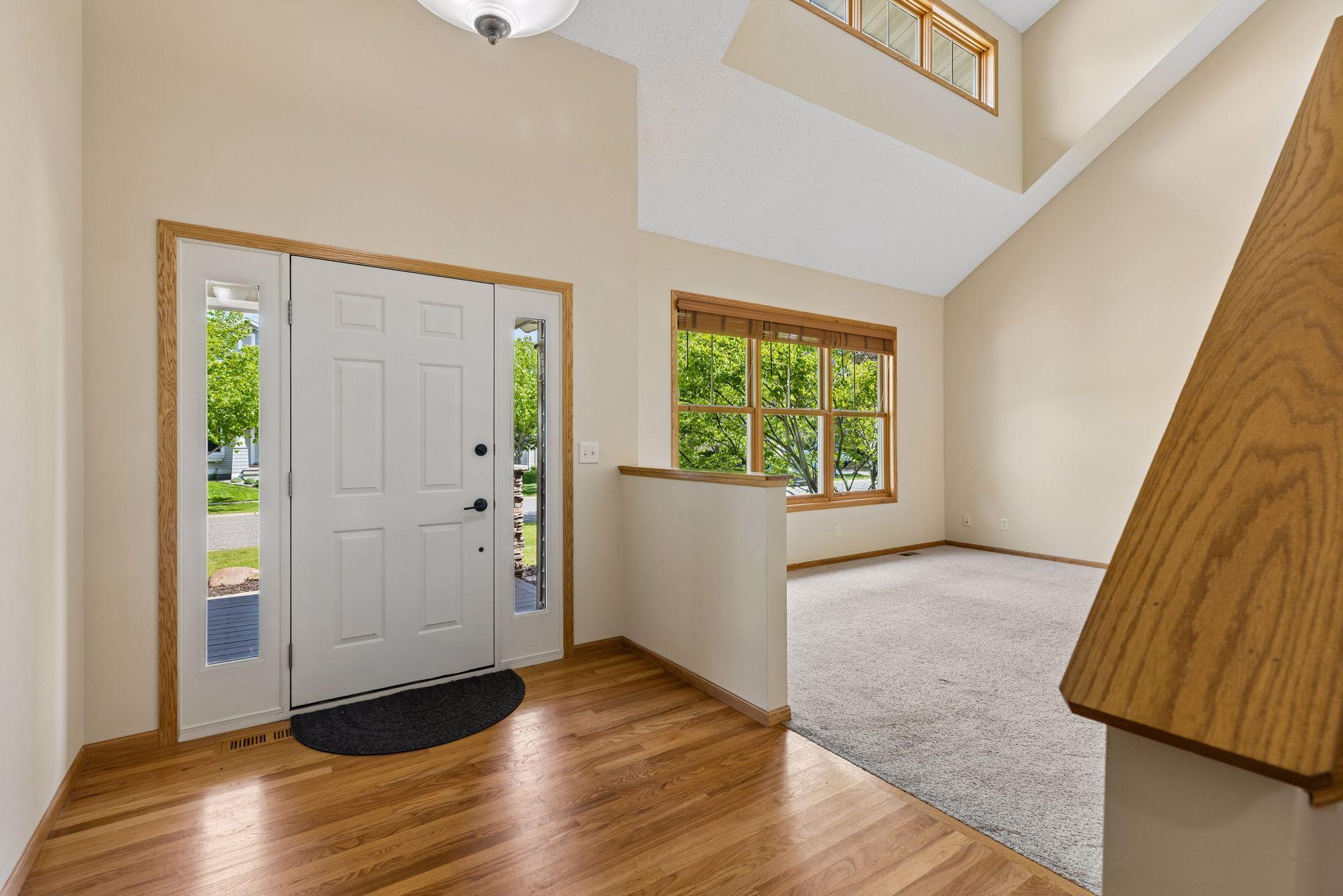 Soaring ceilings create a bright, open entry