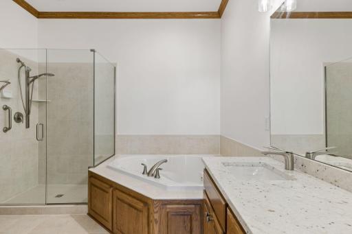 Private primary bathroom with brand new shower doors