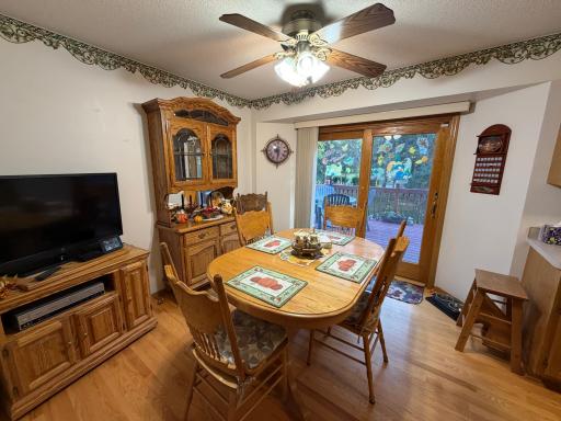 Informal dining off kitchen, Patio door out to large deck.