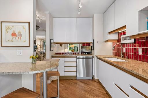 Pass through window to the dining room makes entertaining easy