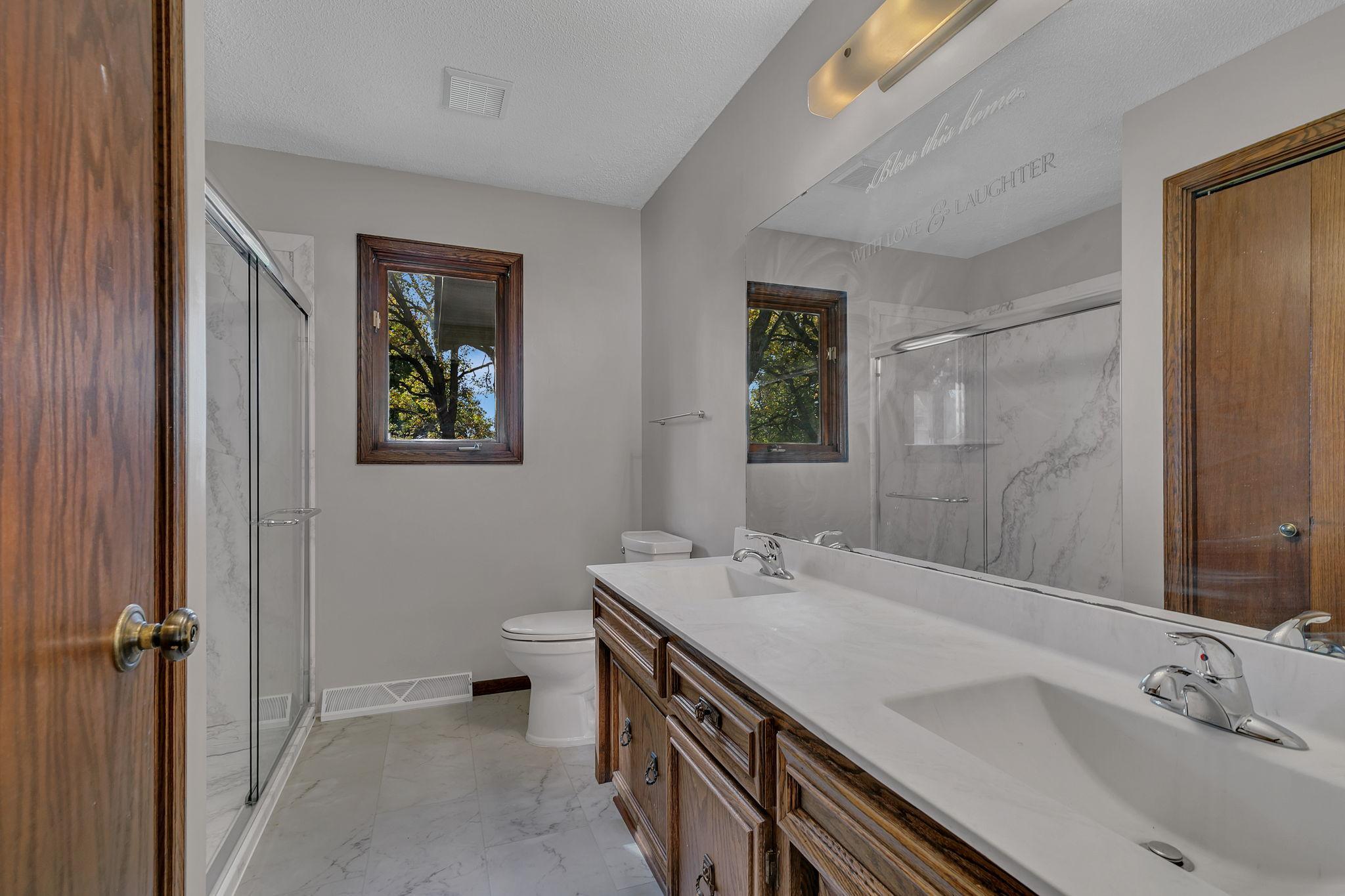 Updated shower and double countertop in the main bath