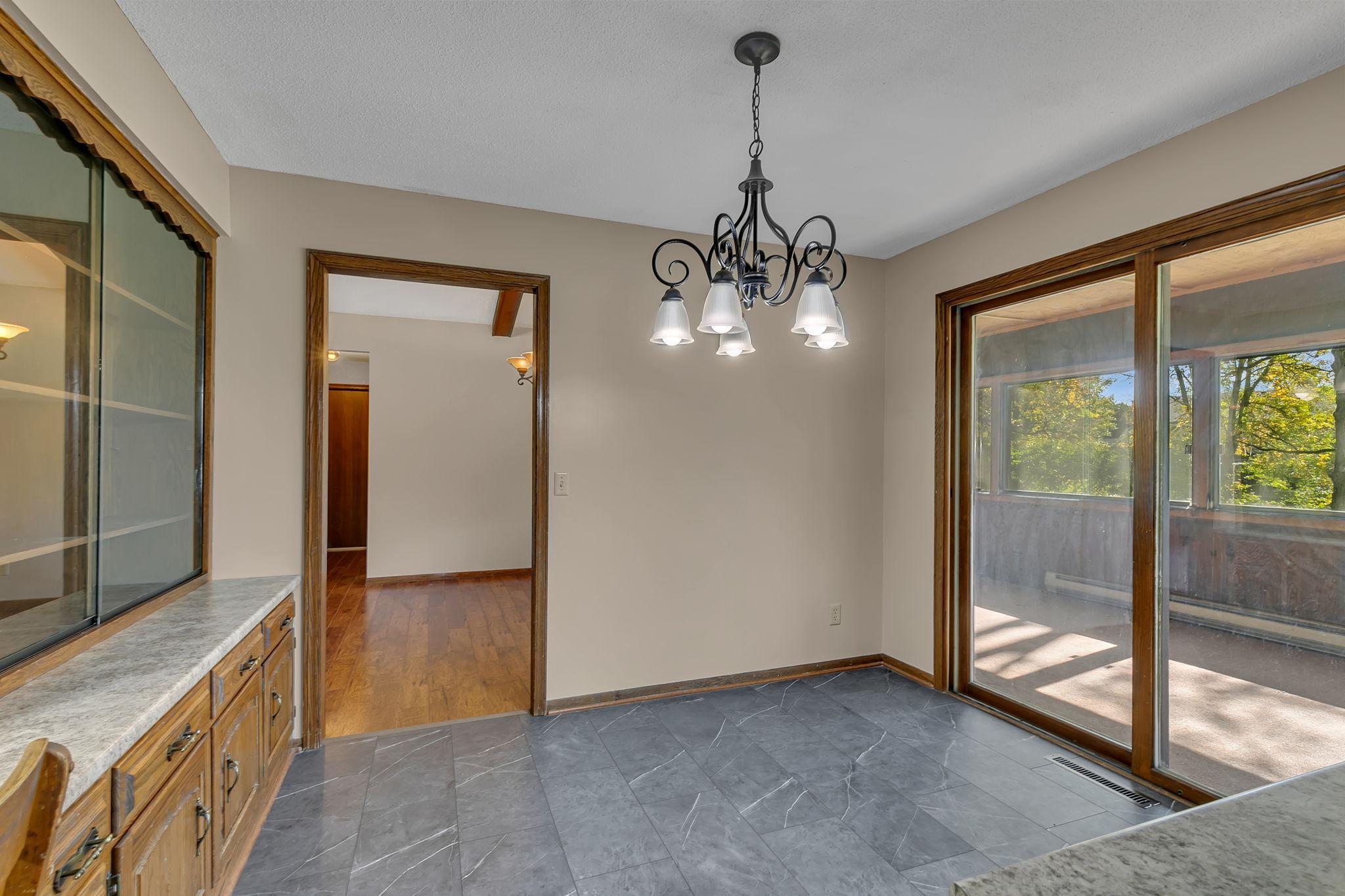 The informal dining leads directly to a formal dining room for larger family gatherings