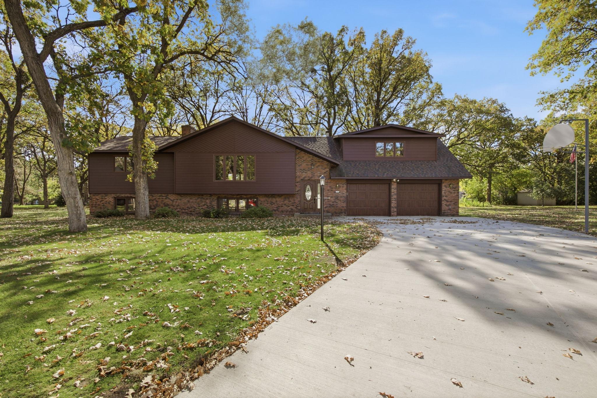 Gorgeous wooded setting on a quiet cul-de-sac Sartell lot