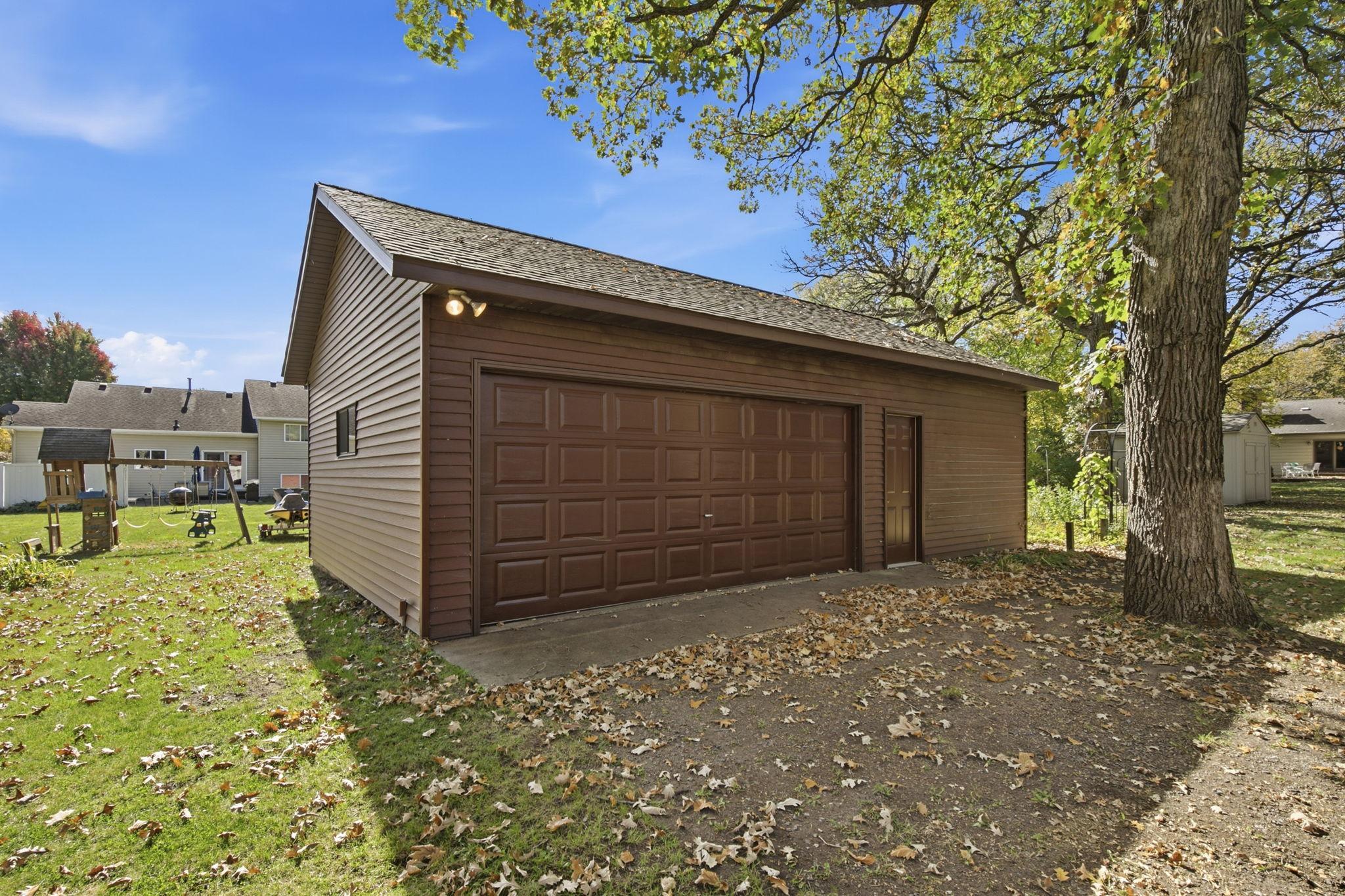Check out the OVERSIZED double detached heated garage!