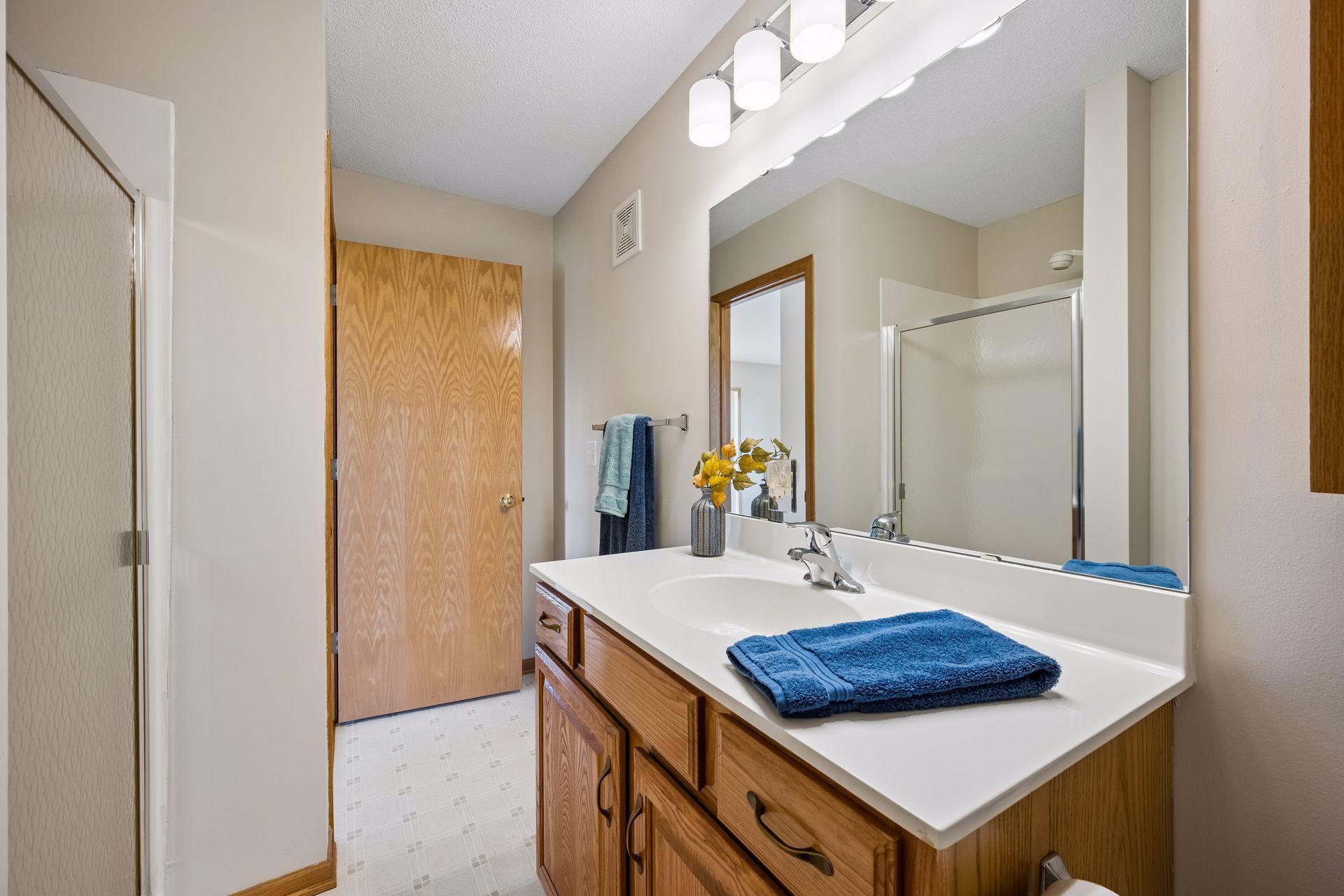 The 3/4 guest bath is just across the hall from the guest bedroom.