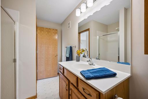 The 3/4 guest bath is just across the hall from the guest bedroom.