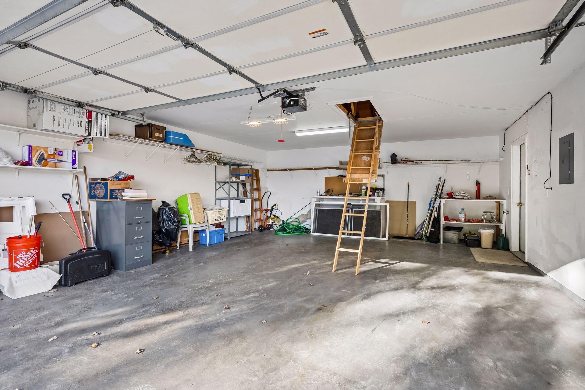 You're going to love this garage! It's 25' deep and also has a pull down ladder with storage above!