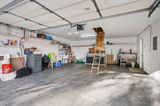 You're going to love this garage! It's 25' deep and also has a pull down ladder with storage above!