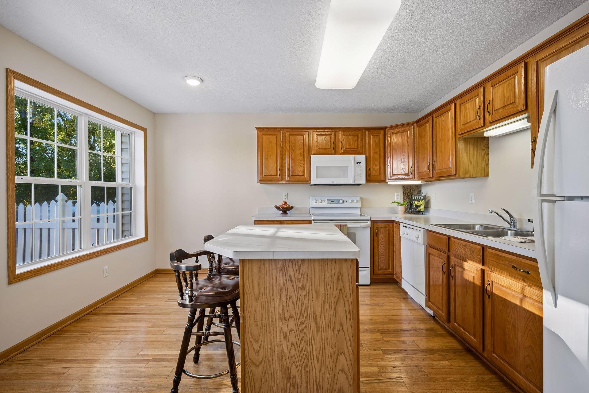 Ample cabinets and counter space in the kitchen.