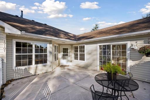 You can also access the patio through the sunrooms sliding glass door.