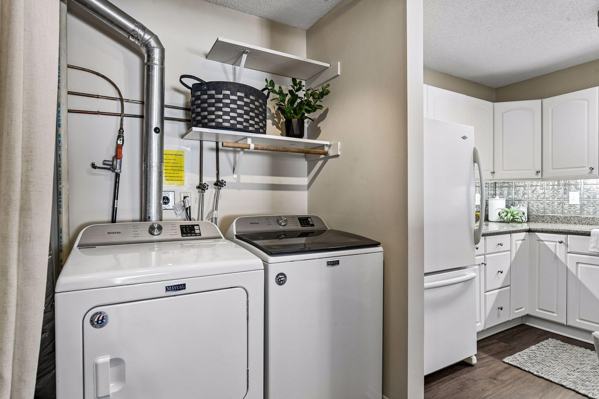 In unit laundry off the kitchen