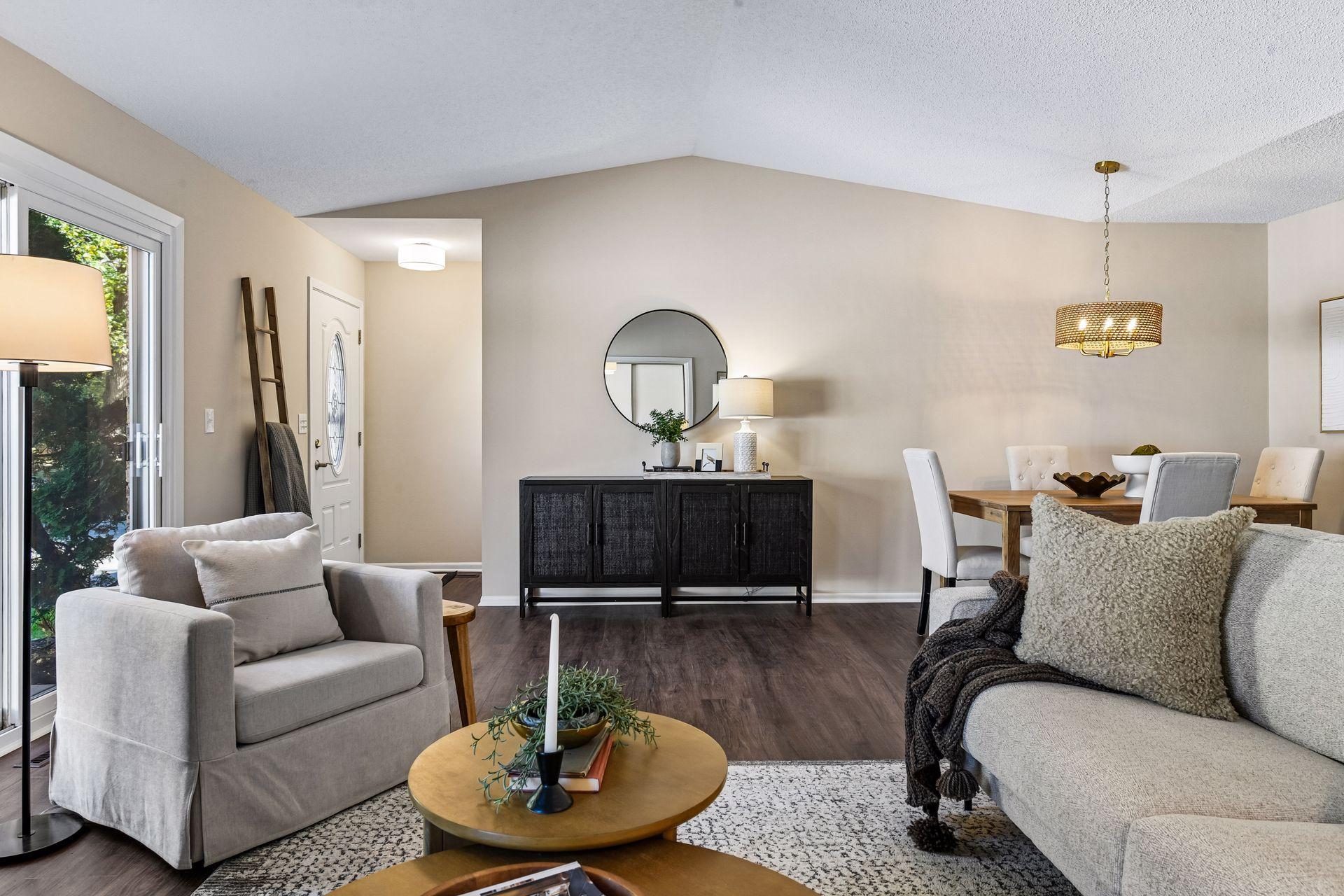 Entry and living room open to dining