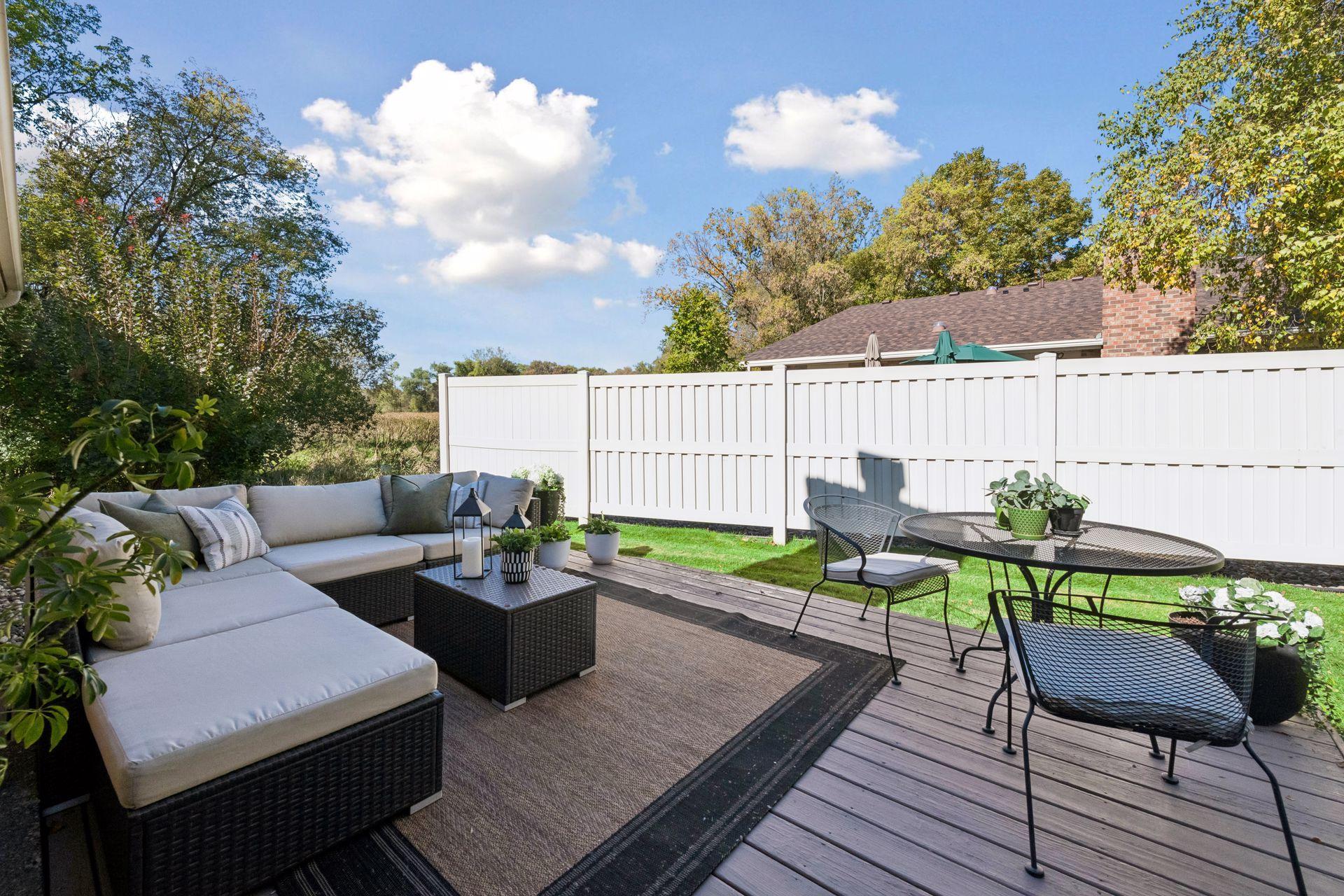 Deck off the front door and off the living room with privacy fence to the north
