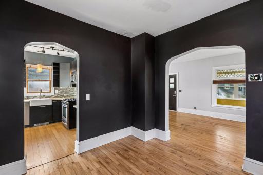 Looking into the kitchen and back toward the living room from the formal dining room.