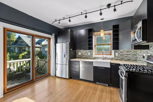 With ample cabinet storage and easy access to the deck through the sliding doors, this kitchen makes everyday living and outdoor entertaining a breeze.