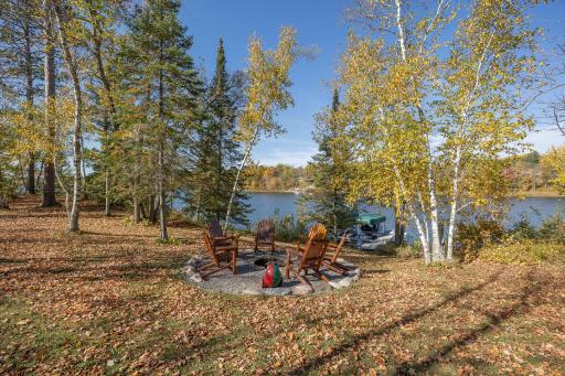 Sit around the bonfire and enjoy spectacular Wabedo Lake views