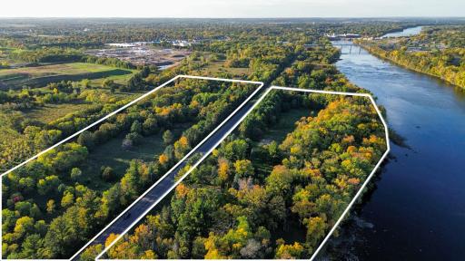 The 15.68 acres is the parcel on the west side of County Road 1, not the parcel that is on the river.