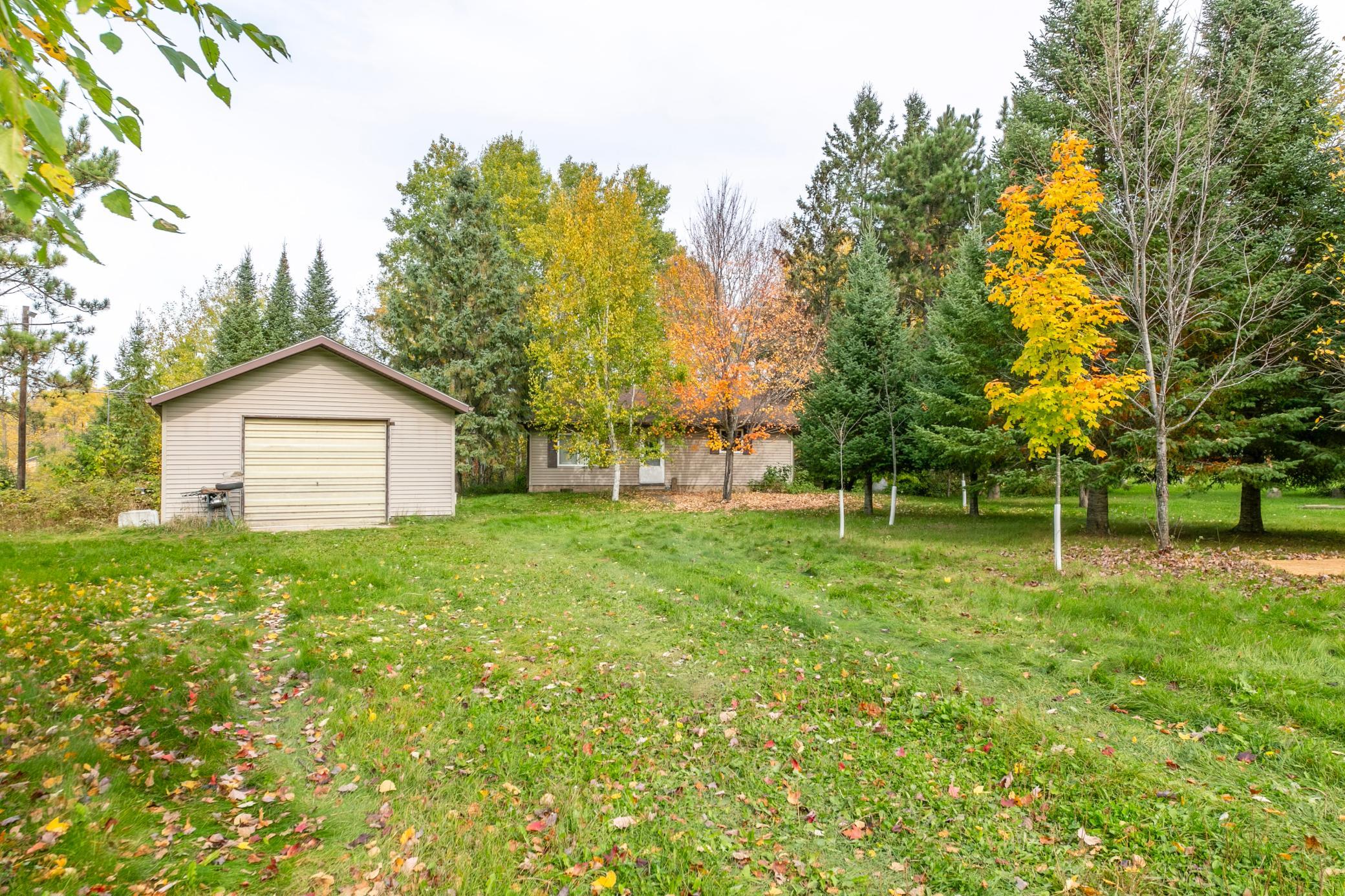 Nice level yard, detached garage and lovely trees