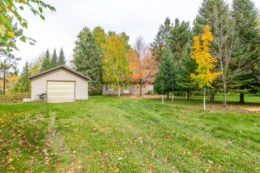 Nice level yard, detached garage and lovely trees