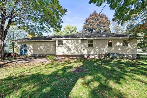 Set on a beautiful lot backing up to a tree-lined neighborhood park.