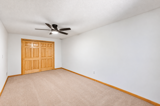 Third bedroom in the lower level. Brand new carpet.