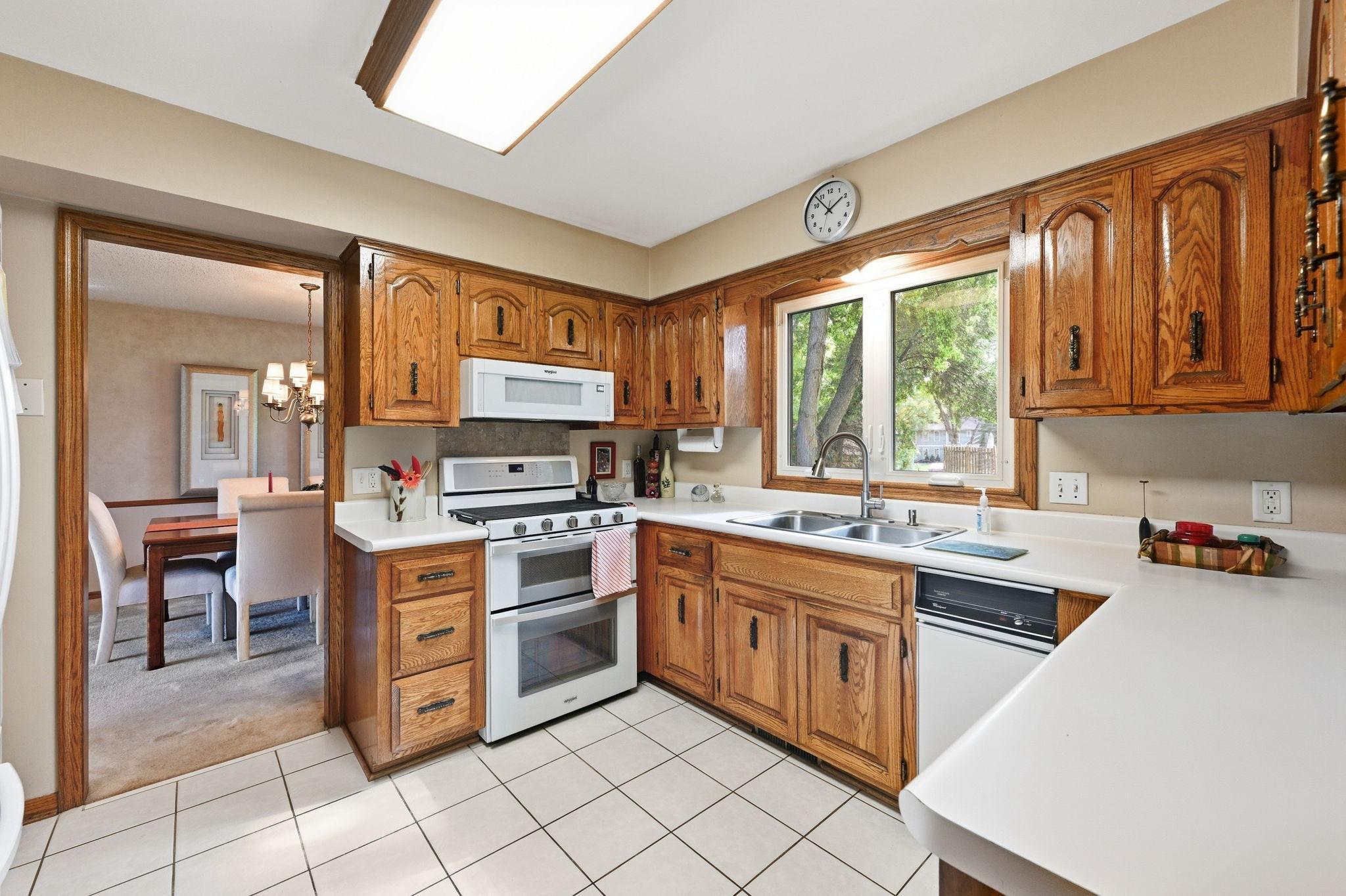 Kitchen windows with view. Cabinets in beautifully restored.