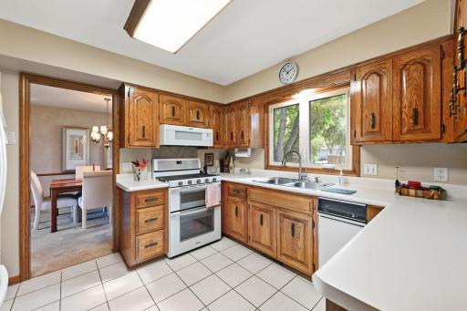 Kitchen windows with view. Cabinets in beautifully restored.