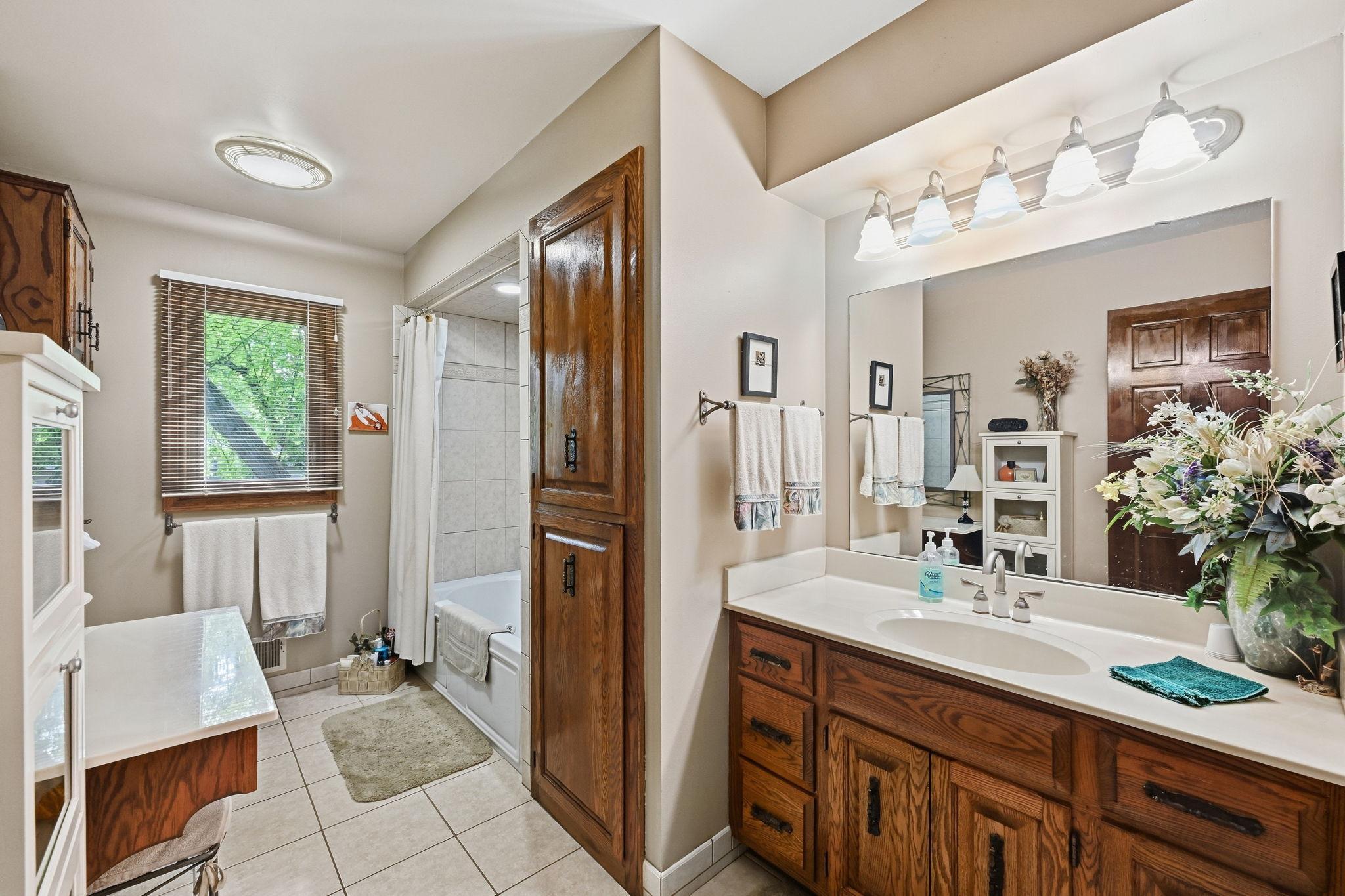 Large main bathroom including tub/shower